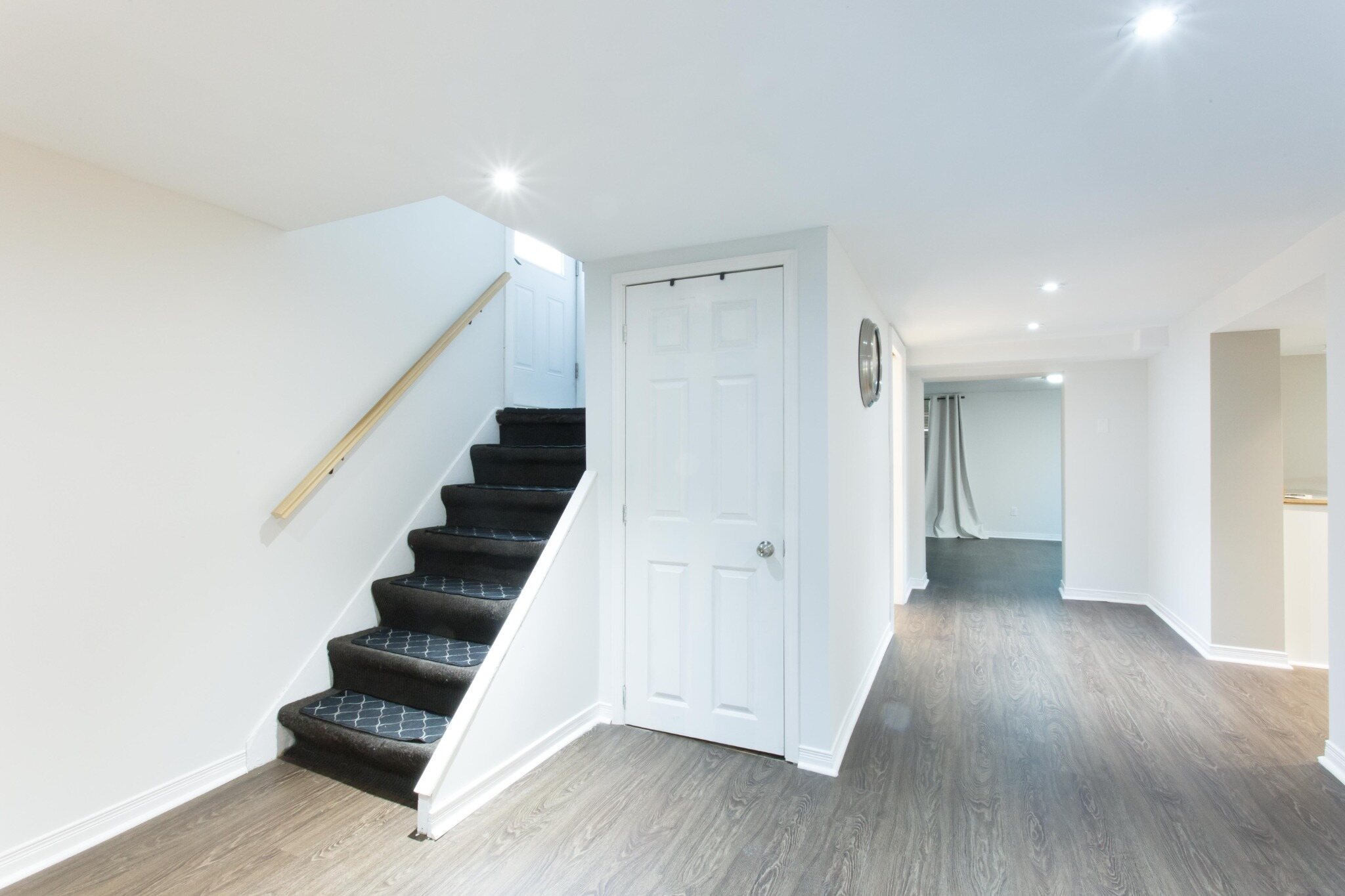 Private basement entrance and interior stairs