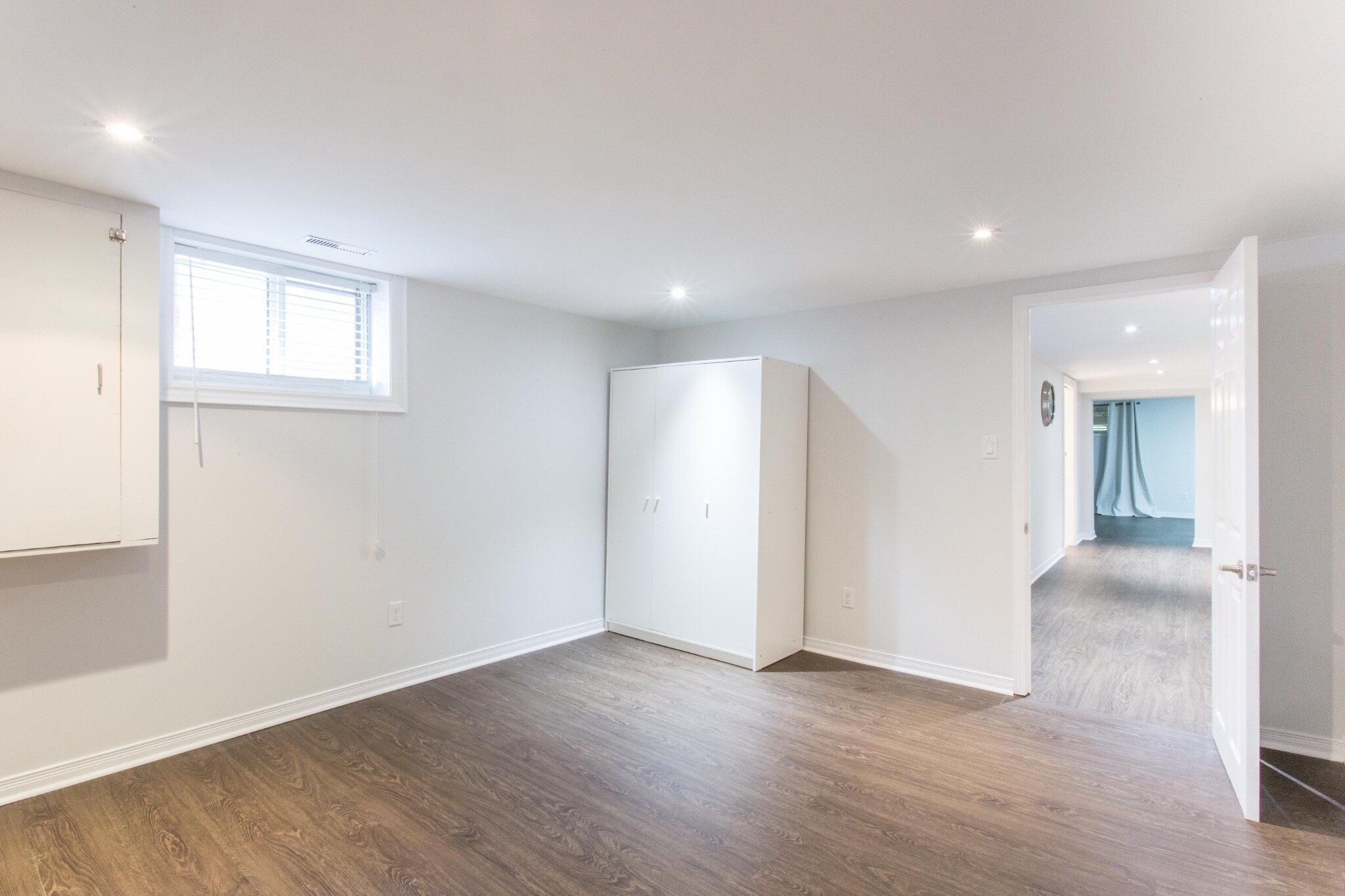 Open living area with recessed lighting